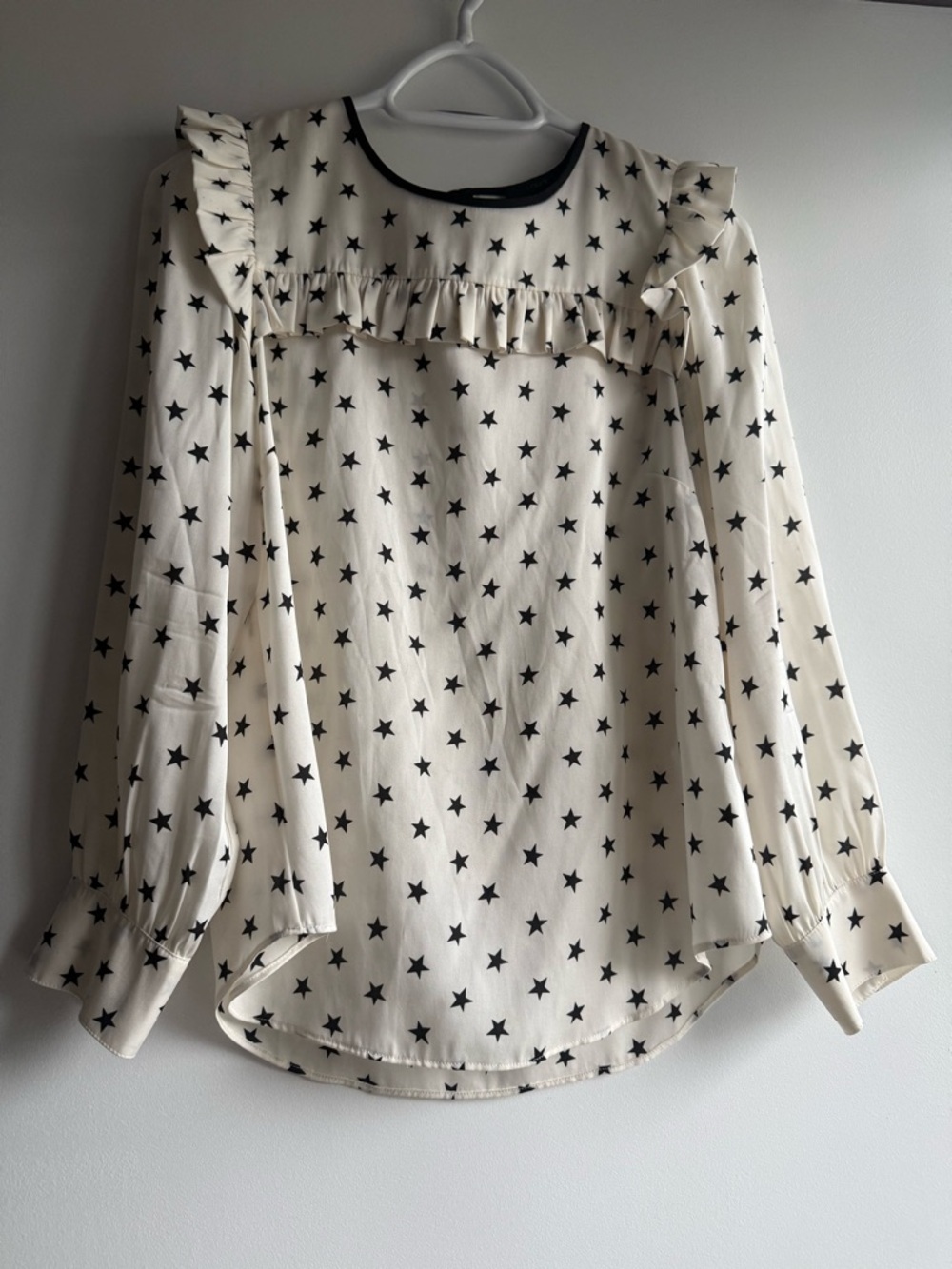 Cream Star-Print Ruffle Blouse